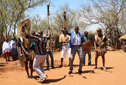Themba awaits his bride with a rousing display of Zulu dance and song